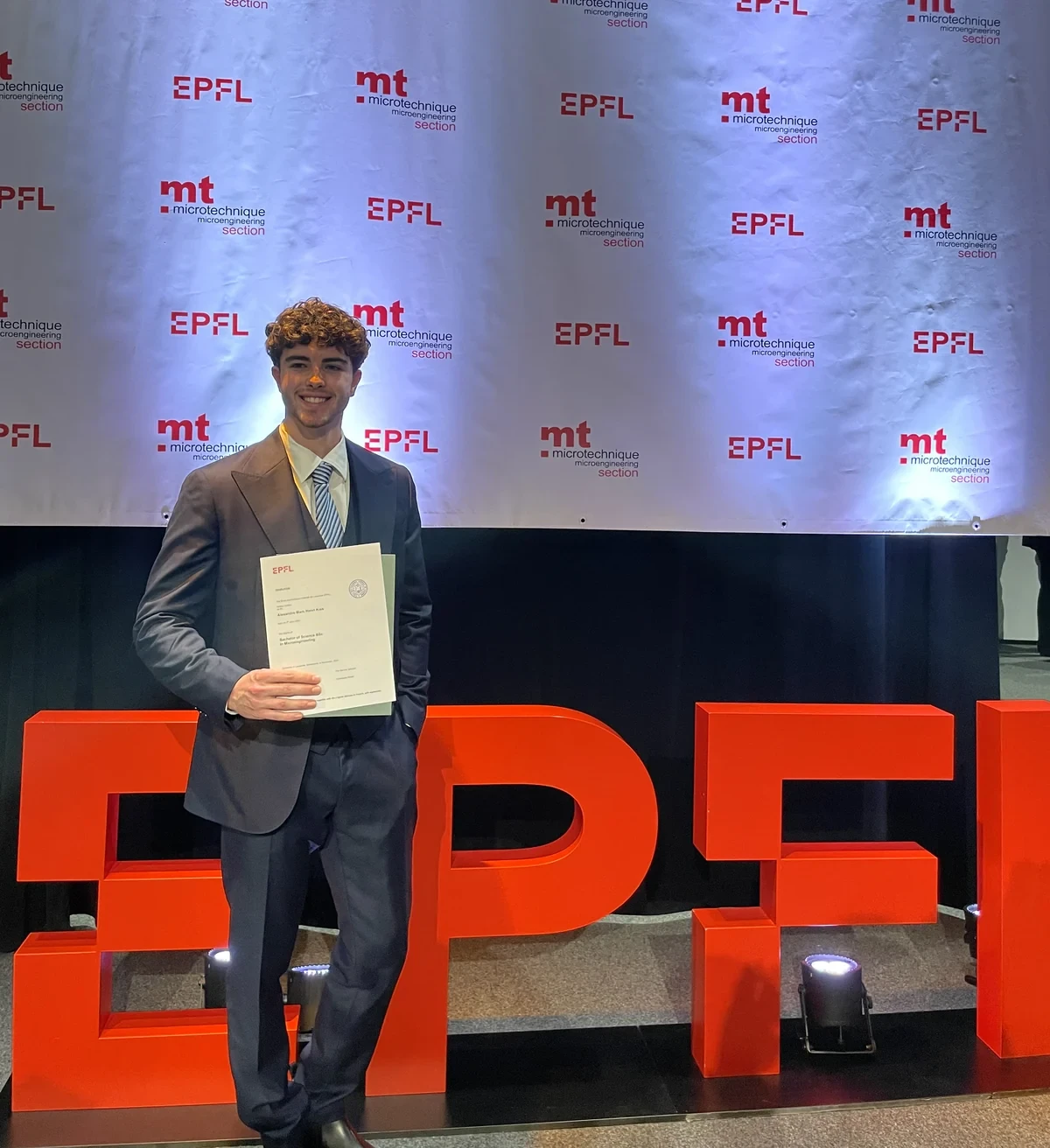 Receiving the bachelor’s diploma at EPFL.