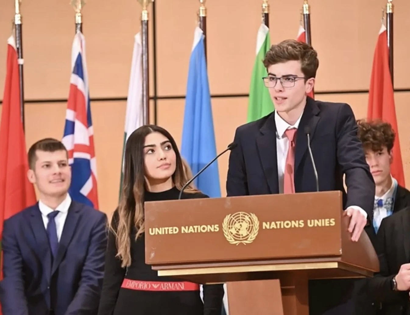 Alexandre speaking at the United Nations lectern in Geneva.